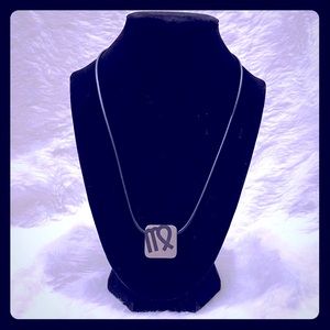 Virgo ♍️ stainless necklace on black rubber cord, sterling twist closure